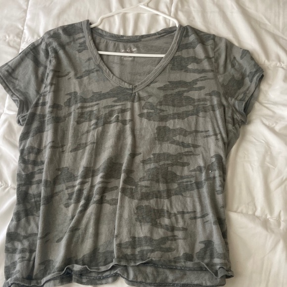 A large sized green camo v-neck cut shirt. - Picture 1 of 4